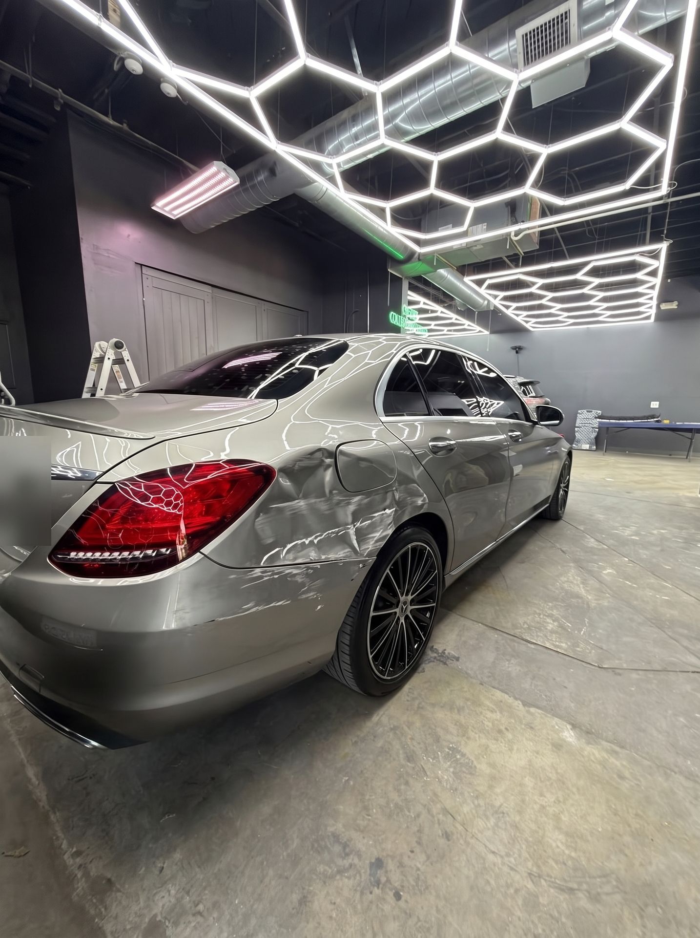 Mercedes C-Class with quarter-panel damage, before repair
