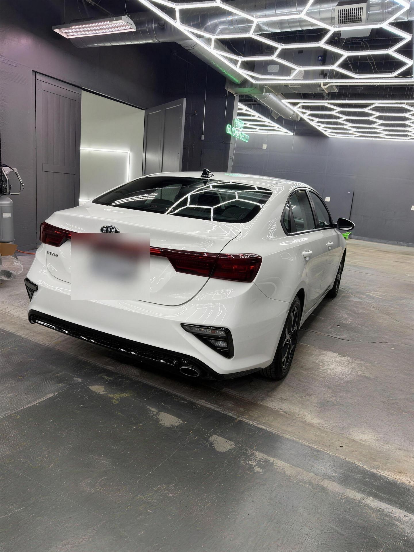 Kia Forte repaired, rear view