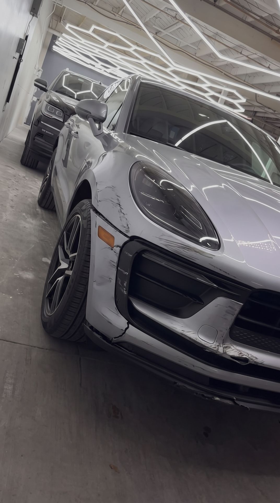 Porsche Macan with collision damage, before repair