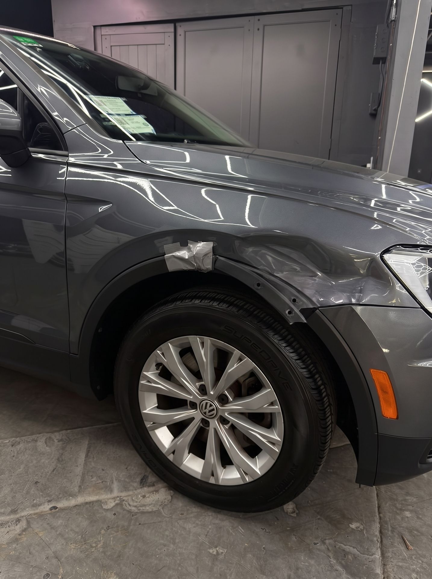 Volkswagen Tiguan with body damage, before repair